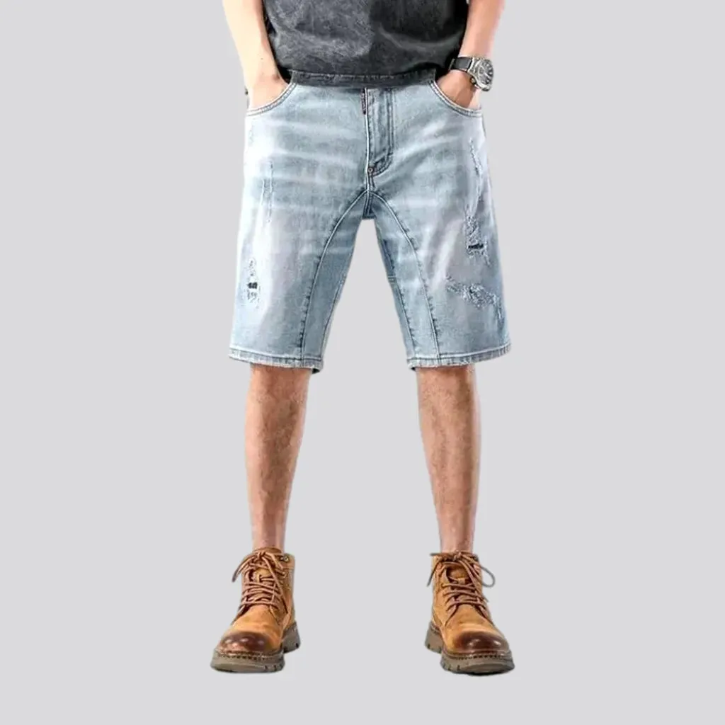 Sanded distressed denim shorts