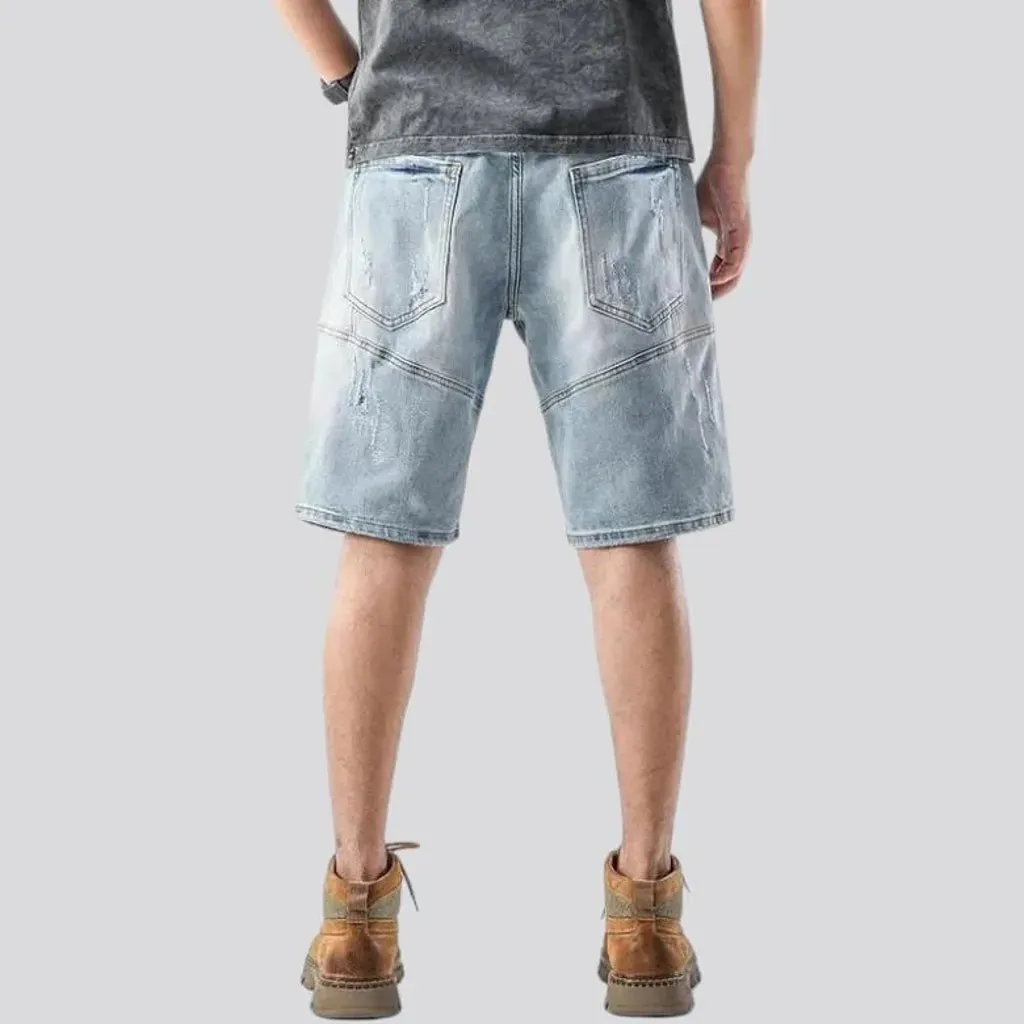 Sanded distressed denim shorts