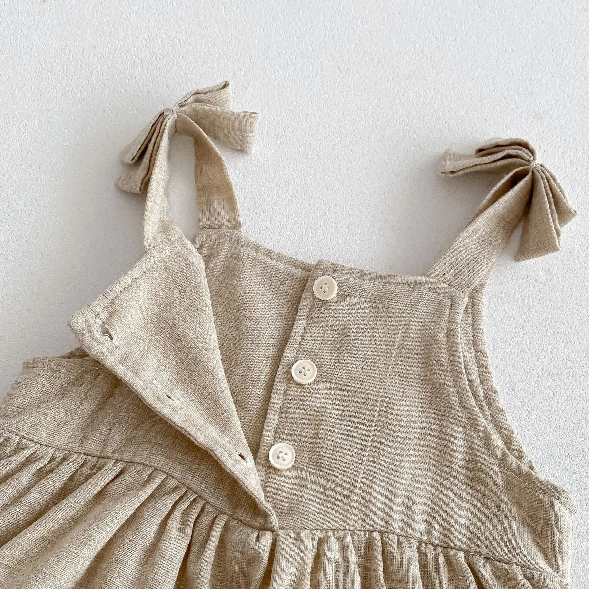 Sleeveless Button-Down Onesie