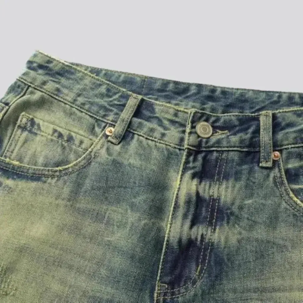 Yellow-cast distressed denim shorts for men