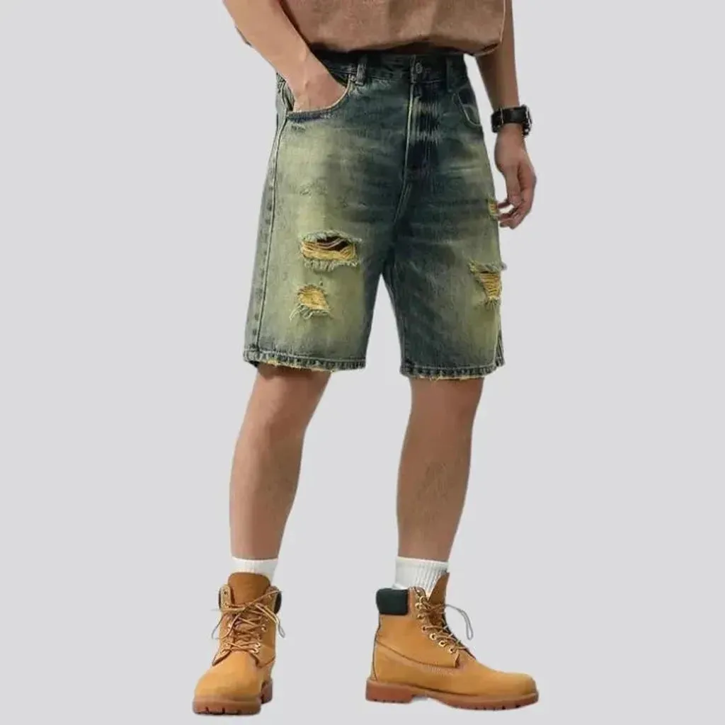 Yellow-cast distressed denim shorts for men