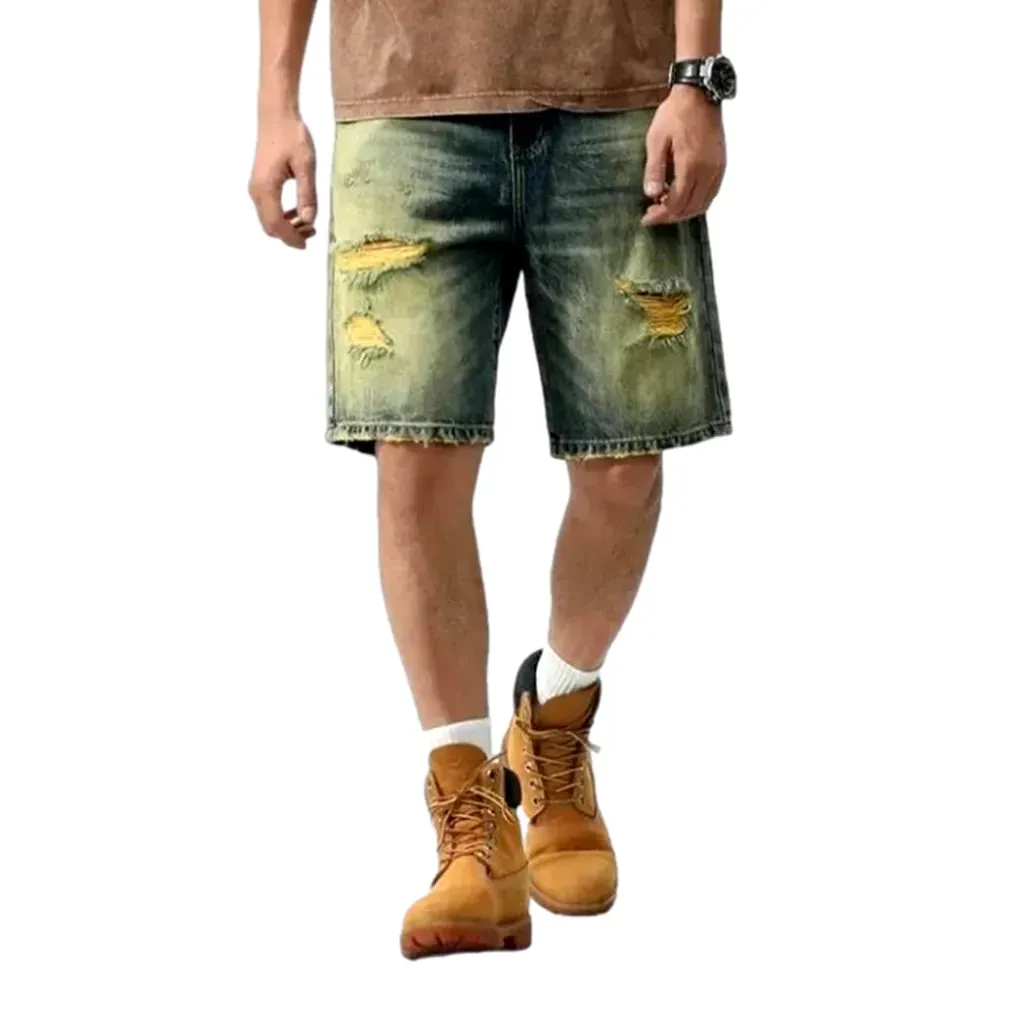 Yellow-cast distressed denim shorts for men